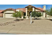 Charming single-story home with a well-manicured front yard and desert landscaping at 1046 E Le Marche Ave, Phoenix, AZ 85022