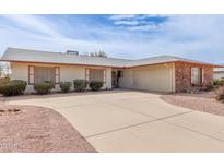 Charming single-story home featuring a two-car garage and well-maintained landscaping at 4701 E Walatowa St, Phoenix, AZ 85044