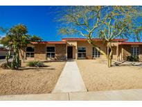 Charming single-story home featuring desert landscaping and a welcoming walkway at 13226 N Cedar Dr, Sun City, AZ 85351