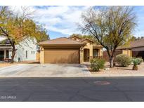 Charming single-Gathering home with a well-maintained yard and inviting curb appeal, perfect for a growing Gathering at 35115 N Bandolier Dr, San Tan Valley, AZ 85144