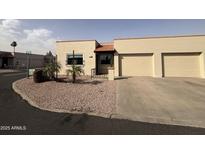 Charming single-story home featuring a two-car garage and low-maintenance landscaping at 440 S Parkcrest -- # 102, Mesa, AZ 85206