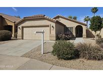 Charming single-story home with desert landscaping, a two car garage, and a welcoming front entrance at 7202 W Mohawk Ln, Glendale, AZ 85308