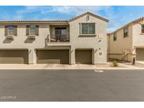 Modern townhome features a private balcony and attached two-car garage at 7445 S 30Th Ter, Phoenix, AZ 85042