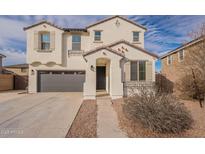 Charming two-story home featuring a neutral palette, tile roof, and an attached two-car garage at 21266 E Via De Olivos --, Queen Creek, AZ 85142