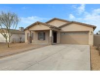 Charming single-story home featuring a two-car garage and a well-maintained front yard at 2540 E Atlanta Ave, Phoenix, AZ 85040