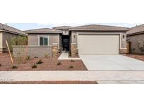 Charming single-story home with a two-car garage and low-maintenance desert landscaping at 17842 W Getty Dr, Goodyear, AZ 85338