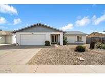 Charming single-story home with a well-maintained front yard and attached garage at 2801 N Dakota St, Chandler, AZ 85225