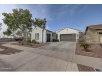 Charming single-Gathering home featuring a two-car garage and beautifully landscaped front yard at 20766 W White Rock Rd, Buckeye, AZ 85396