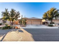 Charming single-Gathering home with desert landscaping and a spacious two-car garage in a desirable neighborhood at 702 S 119Th Ave, Avondale, AZ 85323