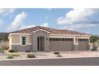 Inviting single-story home boasting a neutral color palette, a three-car garage, and a tiled roof at 12365 W Marguerite Ave, Avondale, AZ 85323