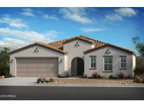 Beautiful single-story home with a neutral color palette, arched entry and a two-car garage at 2434 W Hidalgo Ave, Phoenix, AZ 85041