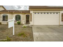 Charming home featuring a neutral-colored exterior, tile roof, and well-maintained landscaping at 10960 E Monte Ave # 283, Mesa, AZ 85209