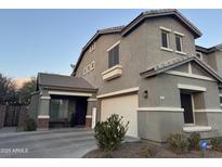 Charming two-story home featuring a spacious two-car garage and inviting covered entryway at 3763 S Laurel Way, Chandler, AZ 85286