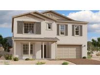 Two-story home featuring a neutral color scheme, attached two-car garage, and shuttered windows at 11447 E Utah Ave, Mesa, AZ 85212