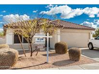 Charming single-story home with a well-maintained front yard and a two-car garage at 28617 N 50Th Pl, Cave Creek, AZ 85331