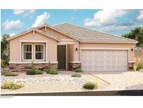 Charming single-story home featuring a two-car garage, desert landscaping and stone accents at 40531 W Michaels Dr, Maricopa, AZ 85138