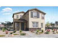Charming two-story home with neutral stucco, gray shutters, and landscaped front yard with a concrete path at 14628 W Sand Hills Rd, Surprise, AZ 85387