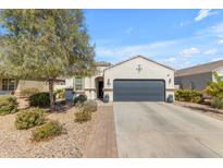 Charming single-story home with a well-maintained yard and two car garage, perfect for suburban living at 37002 W Maddaloni Ave, Maricopa, AZ 85138