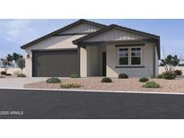 A charming single-story home with a two-car garage and drought resistant landscaping at 15748 W Beryl Ave, Waddell, AZ 85355