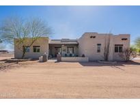 Charming single-story home featuring desert landscaping and a quaint covered front porch at 2349 W Skyline Ln, San Tan Valley, AZ 85144