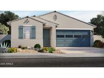 Charming single-story home featuring a blue garage door, shutters, and a well-manicured front yard at 5446 S 244Th Ave, Buckeye, AZ 85326