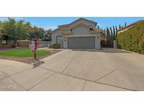 Charming two-story home featuring a spacious driveway and well-maintained landscaping at 1770 S Sabino Dr, Gilbert, AZ 85295