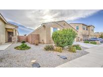 Cozy single-Gathering home featuring desert landscaping with a neutral color palette at 23649 W Watkins St, Buckeye, AZ 85326