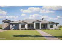 Inviting single-story home featuring modern farmhouse design, lush lawn, and charming curb appeal at 502 E Tanglewood Trl, Phoenix, AZ 85085