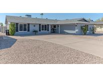 Charming single story home with mature landscaping and a well-maintained front yard at 4815 E Kiva St, Phoenix, AZ 85044