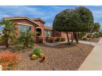 Attractive one-story home with desert landscaping and a covered front porch at 42368 W North Star Dr, Maricopa, AZ 85138