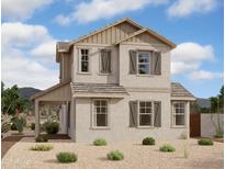 Charming two-story home with a covered porch and neutral-toned stucco exterior at 1905 W Lariat Ln, Phoenix, AZ 85085