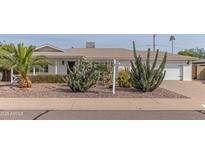 Charming home featuring desert landscaping, a well-maintained yard, and a classic exterior at 6702 E Monte Vista Rd, Scottsdale, AZ 85257