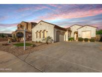 Charming single-story home featuring a well-maintained yard and a spacious driveway at 6915 S Sapphire Way, Chandler, AZ 85249