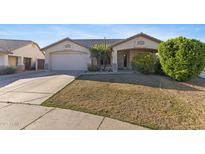 Charming single-story home featuring a two-car garage and low maintenance landscaping at 10164 W Potter Dr, Peoria, AZ 85382
