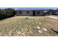 Charming single-story home with a desert front yard and quaint stepping stones, providing curb appeal at 1210 E Marny Rd, Tempe, AZ 85288