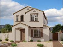 Charming two-story home featuring a classic design and inviting front entrance, surrounded by well-kept landscaping at 1909 W Lariat Ln, Phoenix, AZ 85085