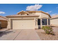 Charming single-Gathering home featuring a two-car garage and well-maintained landscaping at 6718 E Northridge St, Mesa, AZ 85215