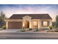 Charming single-story home with a stucco facade, tile roof, and well-maintained landscaping at 7820 W Mockingbird Way, Florence, AZ 85132