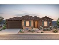 Charming single-story home featuring a stone accent wall, two-car garage, and desert landscaping at 7870 W Mockingbird Way, Florence, AZ 85132