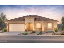 Charming single-story home with a stucco exterior, two-car garage, and desert landscaping at 7888 W Mockingbird Way, Florence, AZ 85132