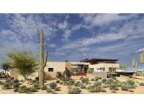 Stunning modern desert home featuring stone accents and native landscaping at 8167 E Leaning Rock Rd # 193, Scottsdale, AZ 85266