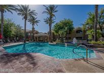 Enjoy this sparkling pool with fountains and resort-style amenities, perfect for relaxation and recreation at 10401 N 52Nd St # 124, Paradise Valley, AZ 85253