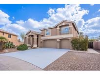 Beautiful two-story home with a three-car garage and well-maintained landscaping at 1473 E Mead Dr, Chandler, AZ 85249