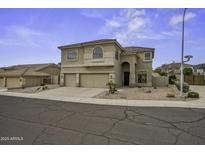 Charming two-story home with desert landscaping, spacious garage, and a neutral color palette at 16606 S 15Th Ln, Phoenix, AZ 85045