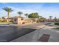 A community entrance sign for 'Calabria' with palm trees and a gated entrance at 1855 E Crescent Way, Chandler, AZ 85249