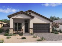 Charming single-story home with a neutral color palette, two-car garage, desert landscaping and covered front porch at 20318 W Turney Ave, Buckeye, AZ 85396