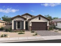 Charming single-story home features a welcoming facade with a two-car garage and attractive desert landscaping at 4395 N 203Rd Ave, Buckeye, AZ 85396