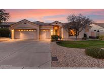 Charming single-story home featuring a three-car garage and well-maintained landscaping at 4614 W Fallen Leaf Ln, Glendale, AZ 85310