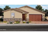 Charming single-story home featuring stone accents, a two-car garage, and desert landscaping in the front yard at 4831 W Hunter Trl, San Tan Valley, AZ 85144