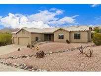 Charming single-story home with desert landscaping and a two-car garage at 16028 N Nyack Dr, Fountain Hills, AZ 85268
